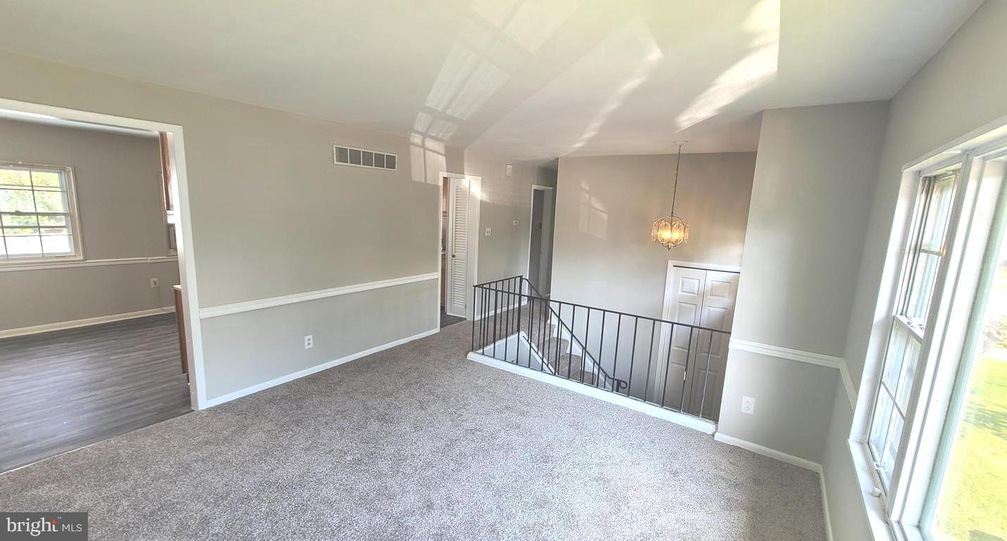 26 Alwyn Road Newark, DE 19713 - Photo 8 of 24 an empty room with windows