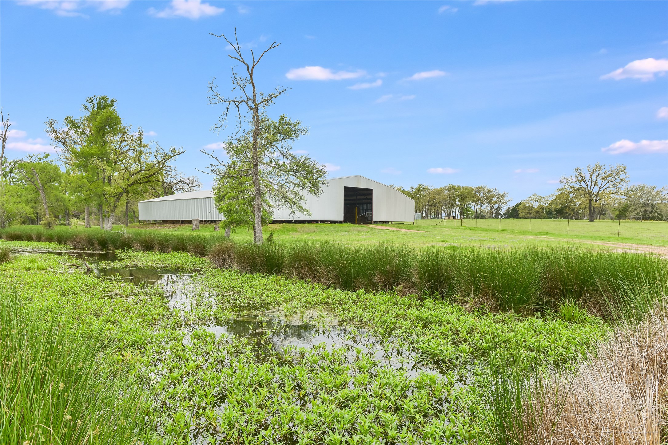 363 Paint Creek S Road, Unit A Paige, TX 78659 - Photo 17 of 28 70' x 100' Hay Barn