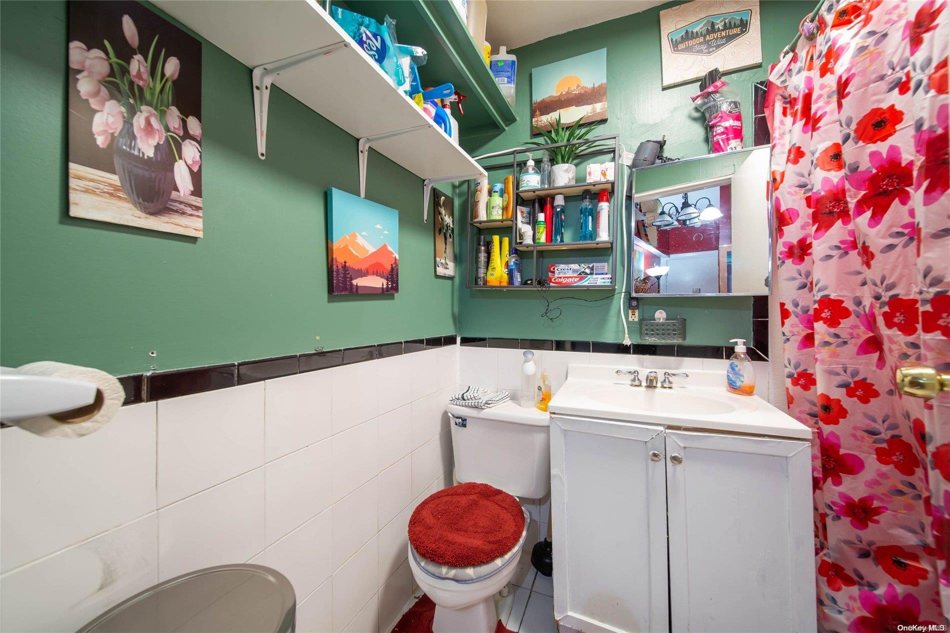 102-18 37th Avenue Queens, NY 11368 - Photo 11 of 12 a utility room with dryer and washer