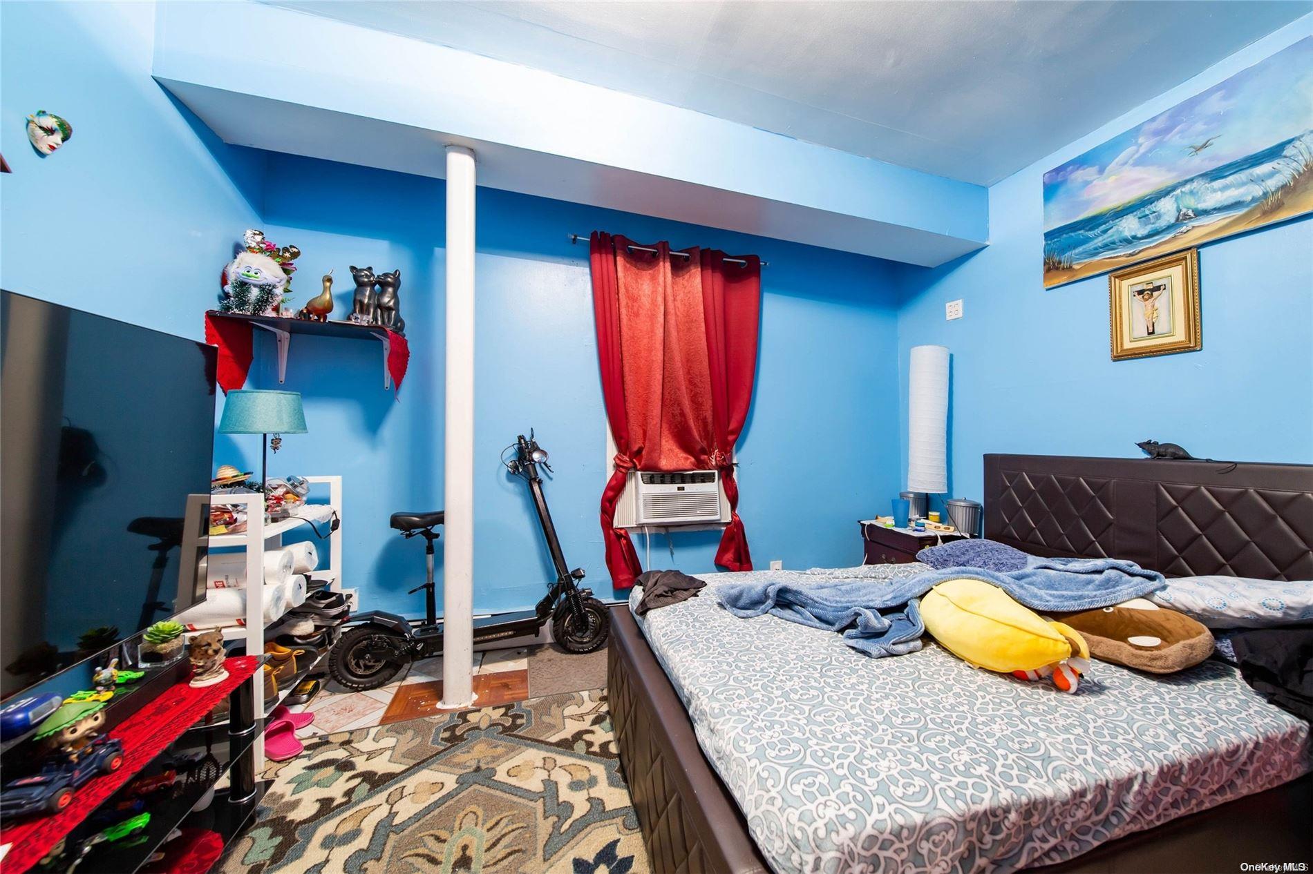 102-18 37th Avenue Queens, NY 11368 - Photo 10 of 12 a room with musical instruments and toys