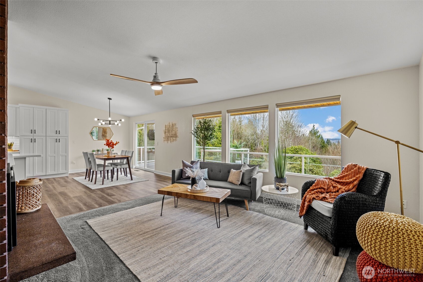 4115 105th Place Southeast Everett, WA 98208 - Photo 16 of 39 a living room with furniture and a large window