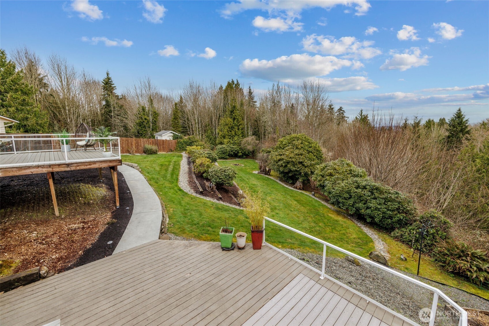 4115 105th Place Southeast Everett, WA 98208 - Photo 20 of 39 a view of a balcony with trees