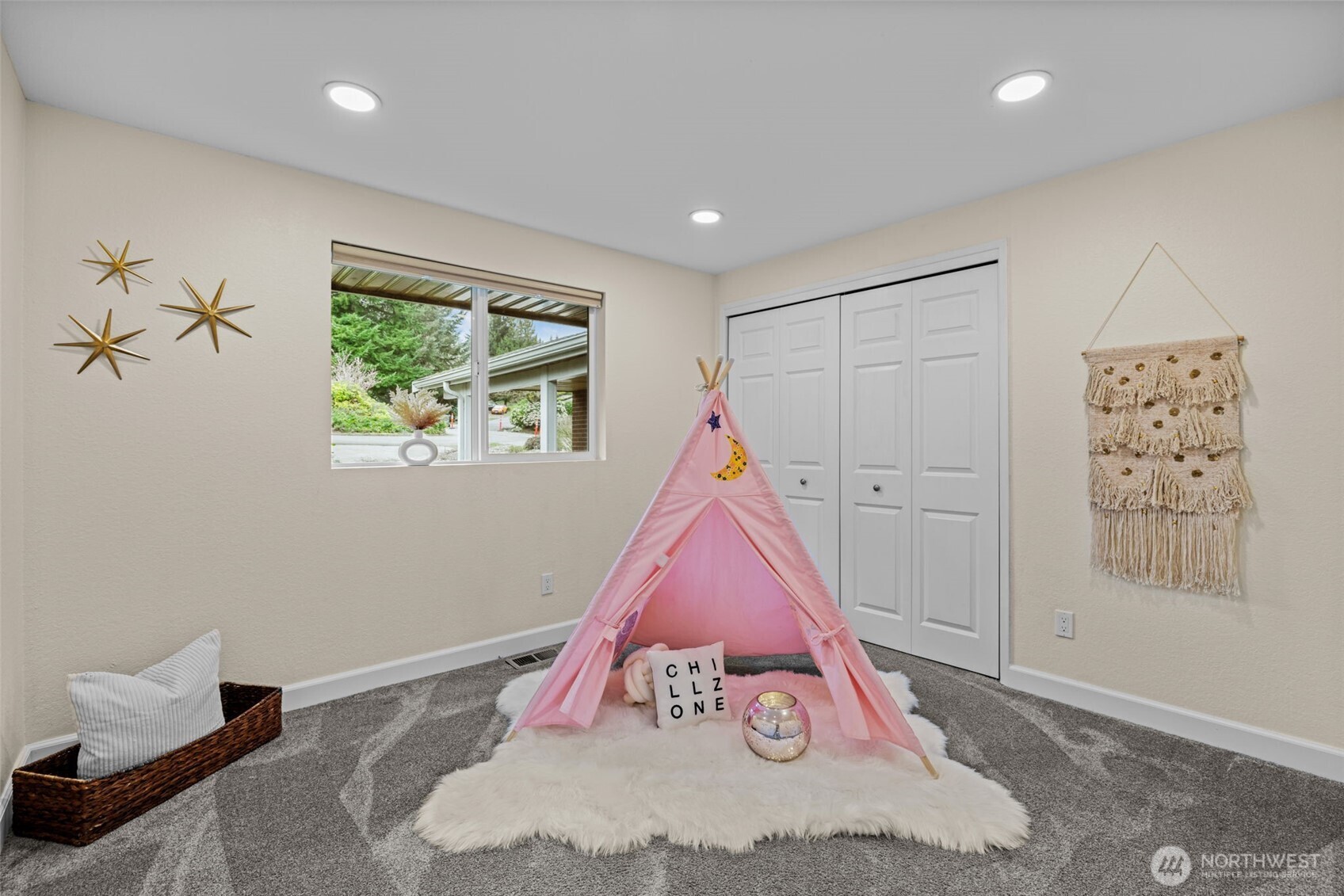 4115 105th Place Southeast Everett, WA 98208 - Photo 23 of 39 a view of a livingroom with wooden floor and a large window