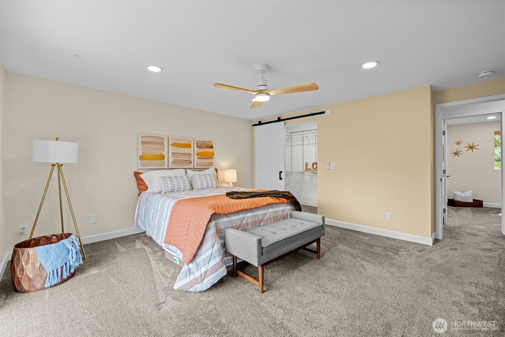 4115 105th Place Southeast Everett, WA 98208 - Photo 26 of 39 a spacious bedroom with a bed and a chandelier