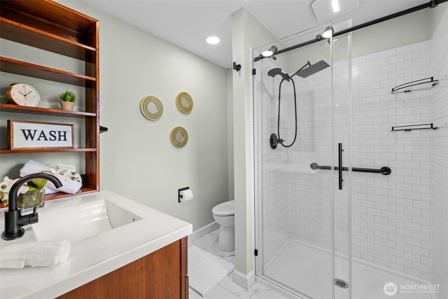 4115 105th Place Southeast Everett, WA 98208 - Photo 27 of 39 a bathroom with a sink toilet and shower