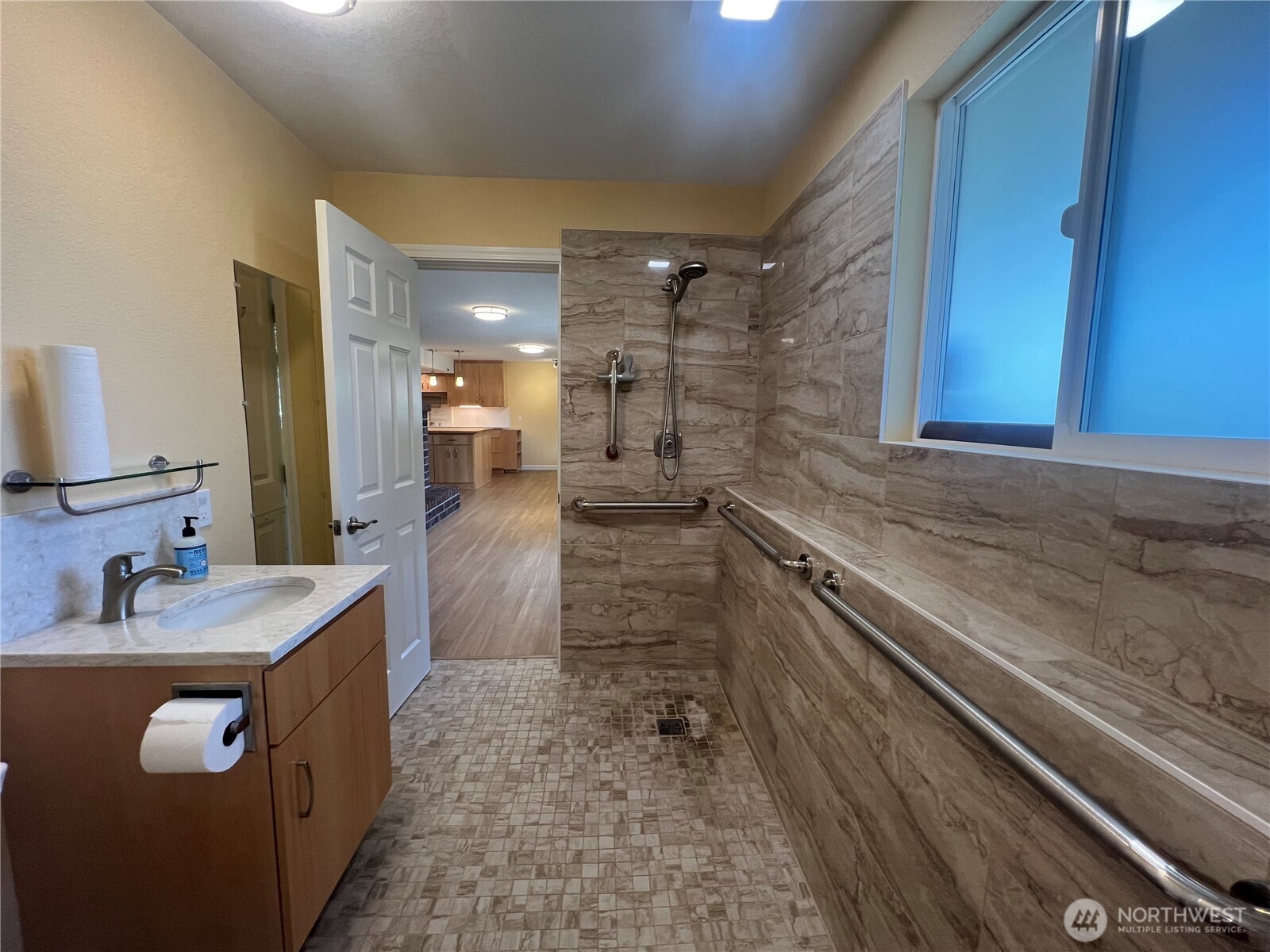 4115 105th Place Southeast Everett, WA 98208 - Photo 33 of 39 a bathroom with a sink a mirror and a shower