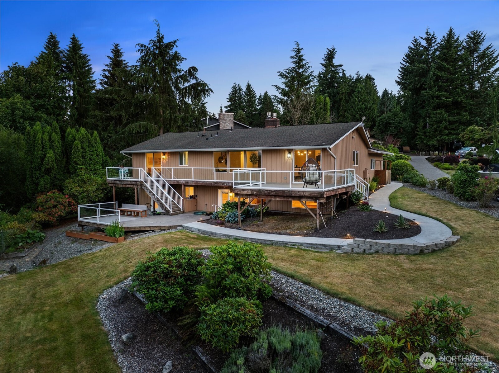 4115 105th Place Southeast Everett, WA 98208 - Photo 7 of 39 an aerial view of a house with swimming pool garden view and trees
