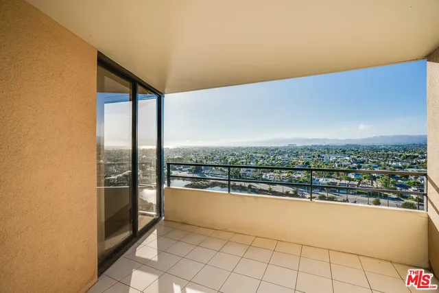 a swimming pool with view of tall buildings