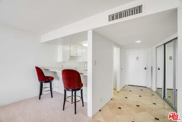 a swimming pool with outdoor seating and yard