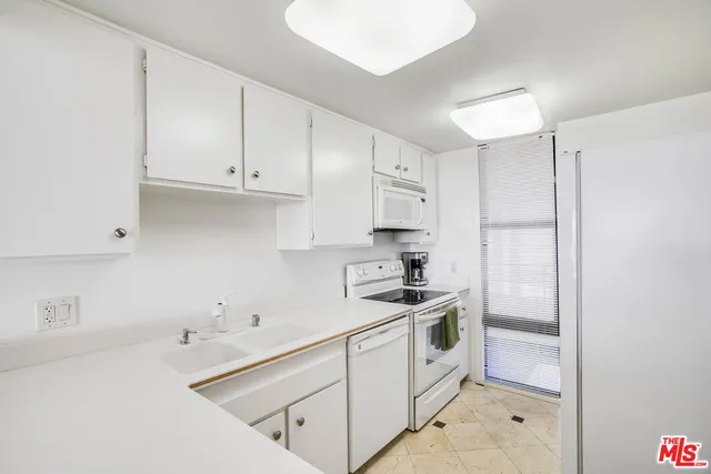 a swimming pool with outdoor seating