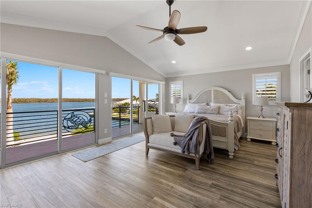 21521 Madera Road Fort Myers Beach, FL 33931 - Photo 27 of 45 a living room with furniture and a floor to ceiling window
