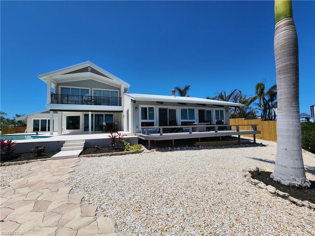 21521 Madera Road Fort Myers Beach, FL 33931 - Photo 43 of 45 a house view with a outdoor space