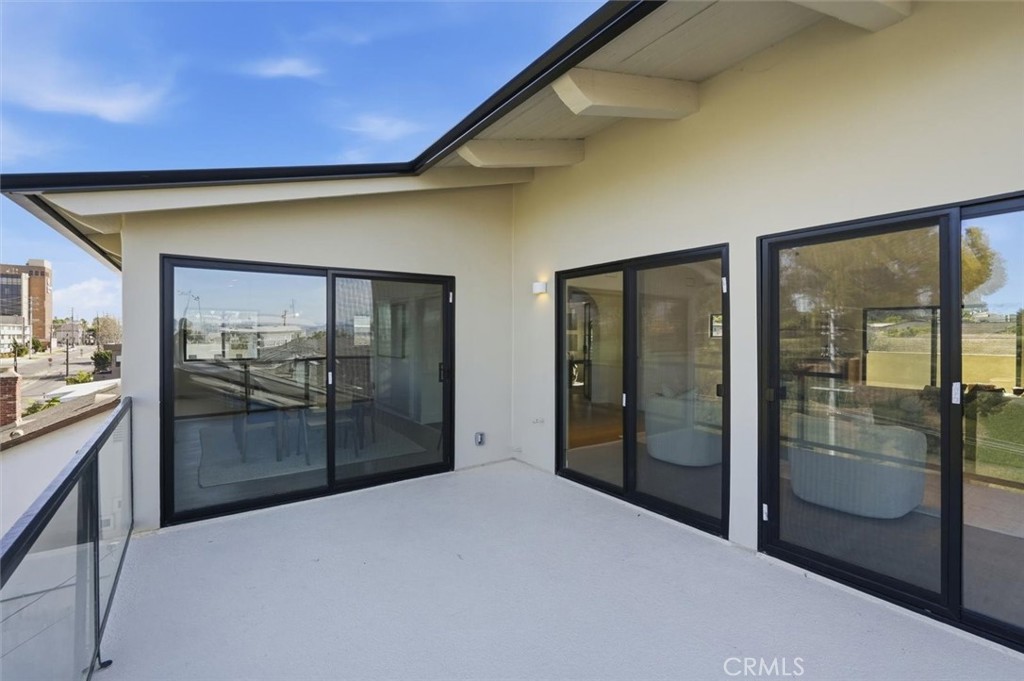 8140 Calabar Avenue Playa del Rey, CA 90293 - Photo 23 of 60 a room with stainless steel appliances kitchen island granite countertop cabinets and glass door