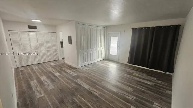 wooden floor in an empty room with wooden floor
