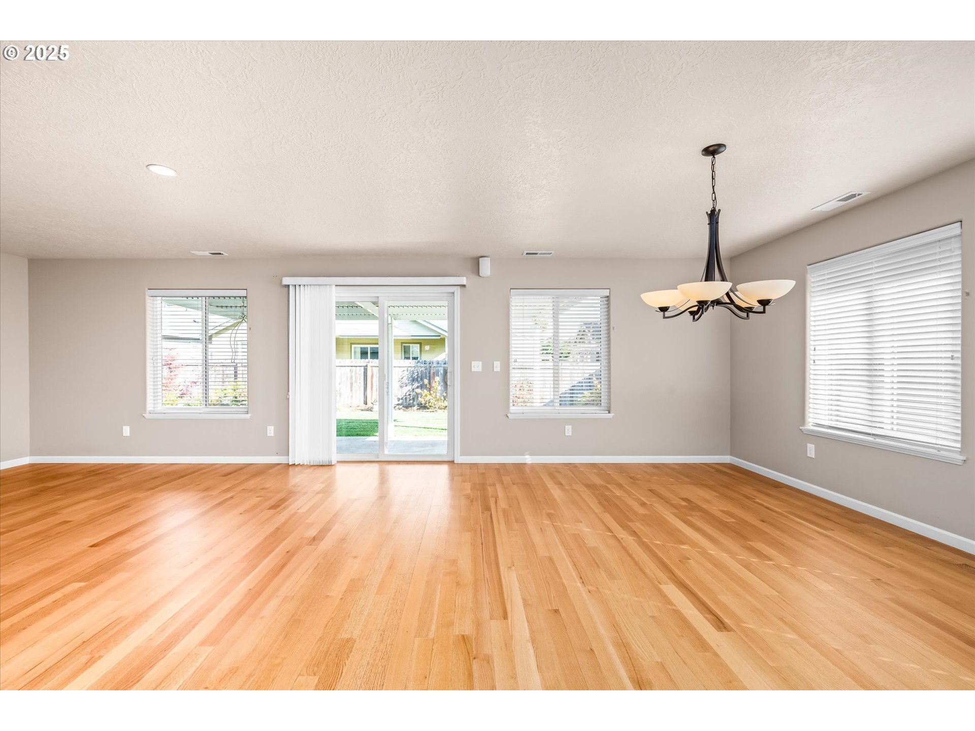 1176 Unity Drive Junction City, OR 97448 - Photo 14 of 44 a view of an empty room with a window