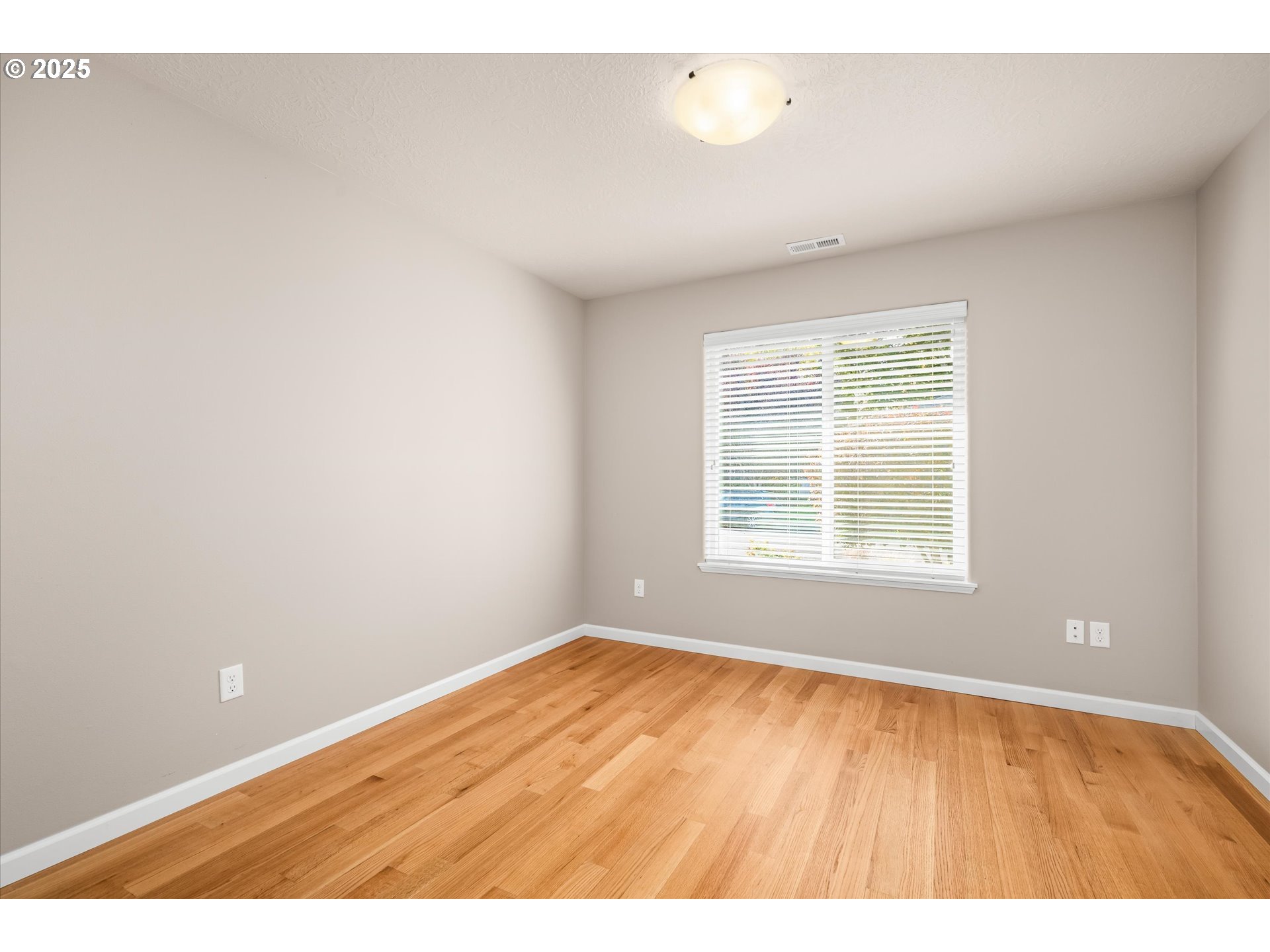 1176 Unity Drive Junction City, OR 97448 - Photo 24 of 44 a view of an empty room with a window