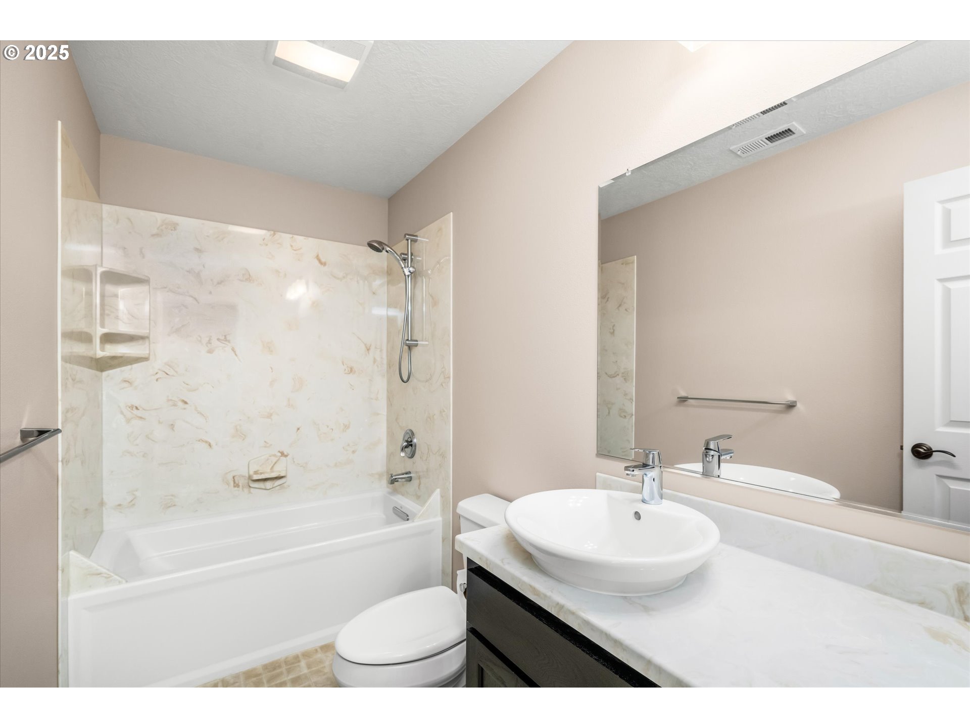 1176 Unity Drive Junction City, OR 97448 - Photo 28 of 44 a bathroom with a sink a toilet and a bathtub