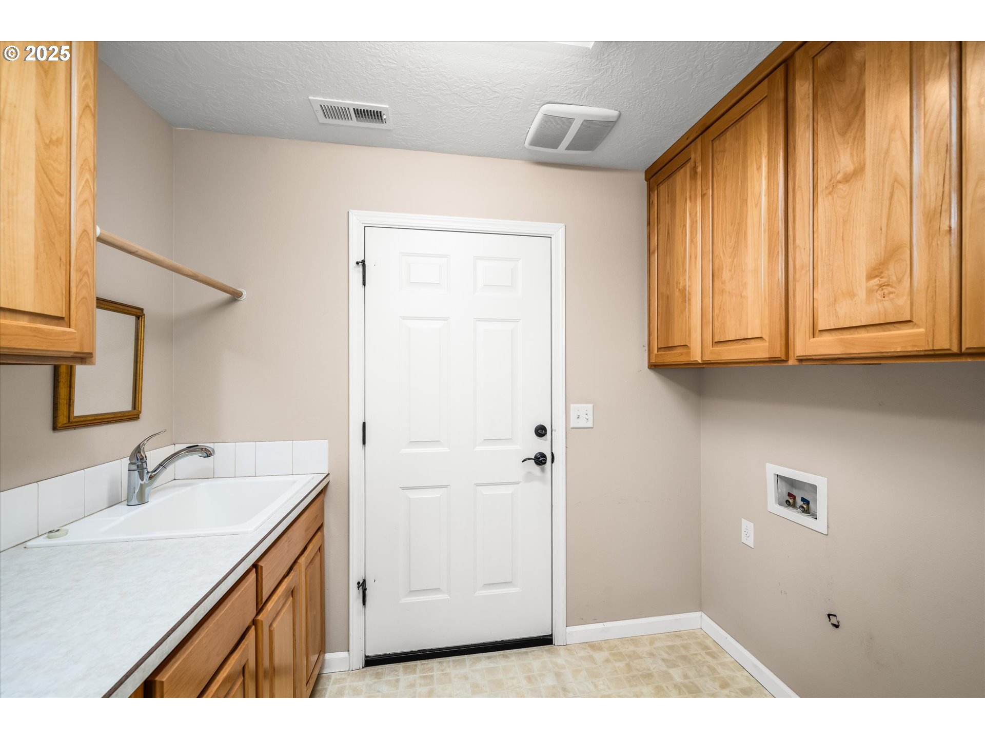 1176 Unity Drive Junction City, OR 97448 - Photo 29 of 44 a bathroom with a sink and a mirror