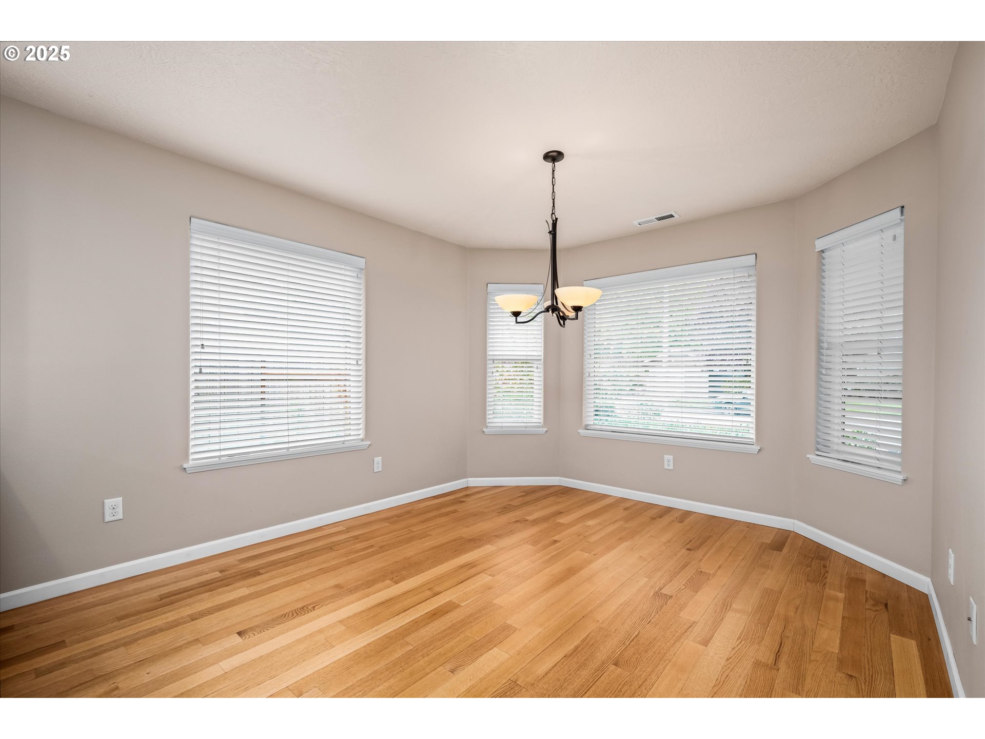 1176 Unity Drive Junction City, OR 97448 - Photo 10 of 44 a view of an empty room with a window