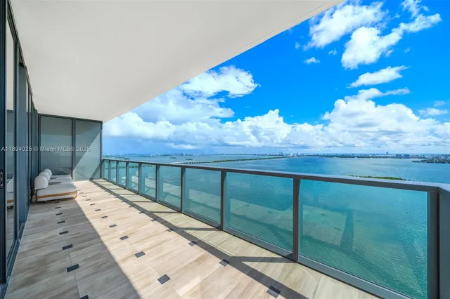 a view of a lake with a city