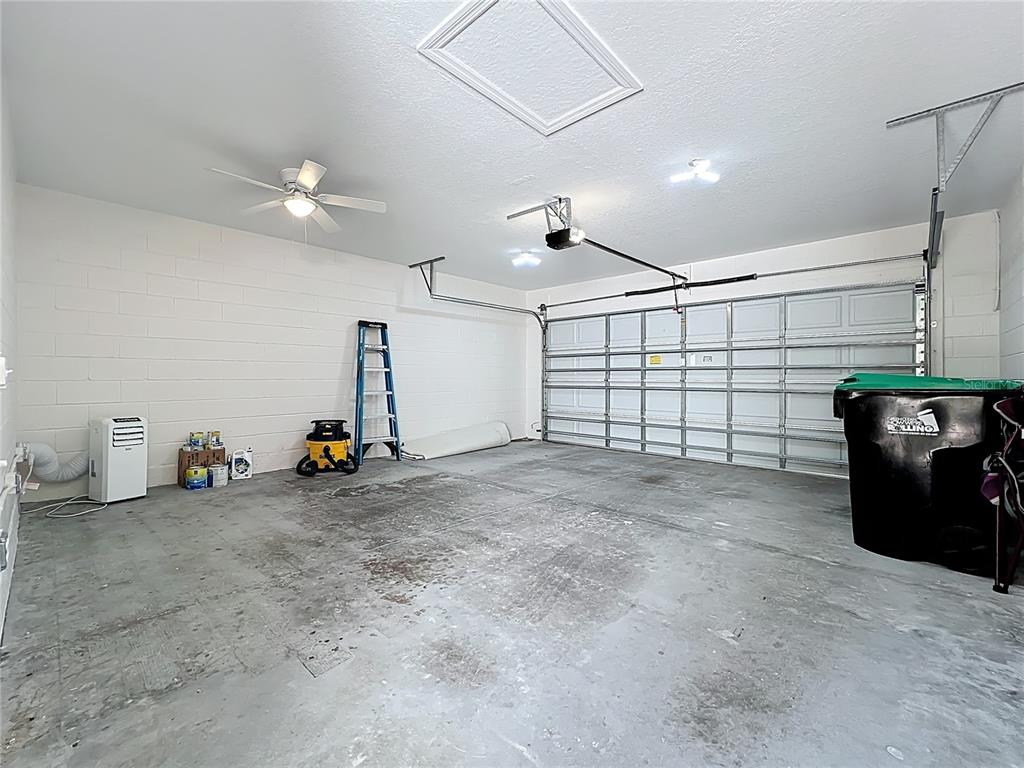 12930 Vennetta Way Windermere, FL 34786 - Photo 28 of 38 a view of a garage