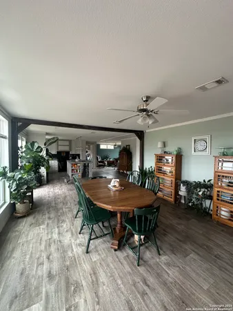 a view of a dining room with furniture
