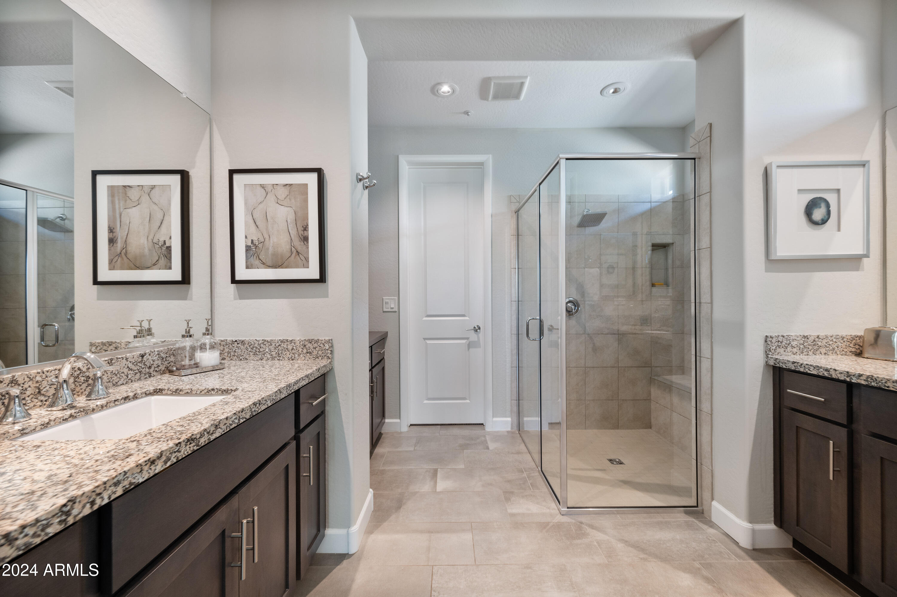 17910 East Cindercone Road Rio Verde, AZ 85263 - Photo 27 of 38 a bathroom with a granite countertop sink mirror and shower