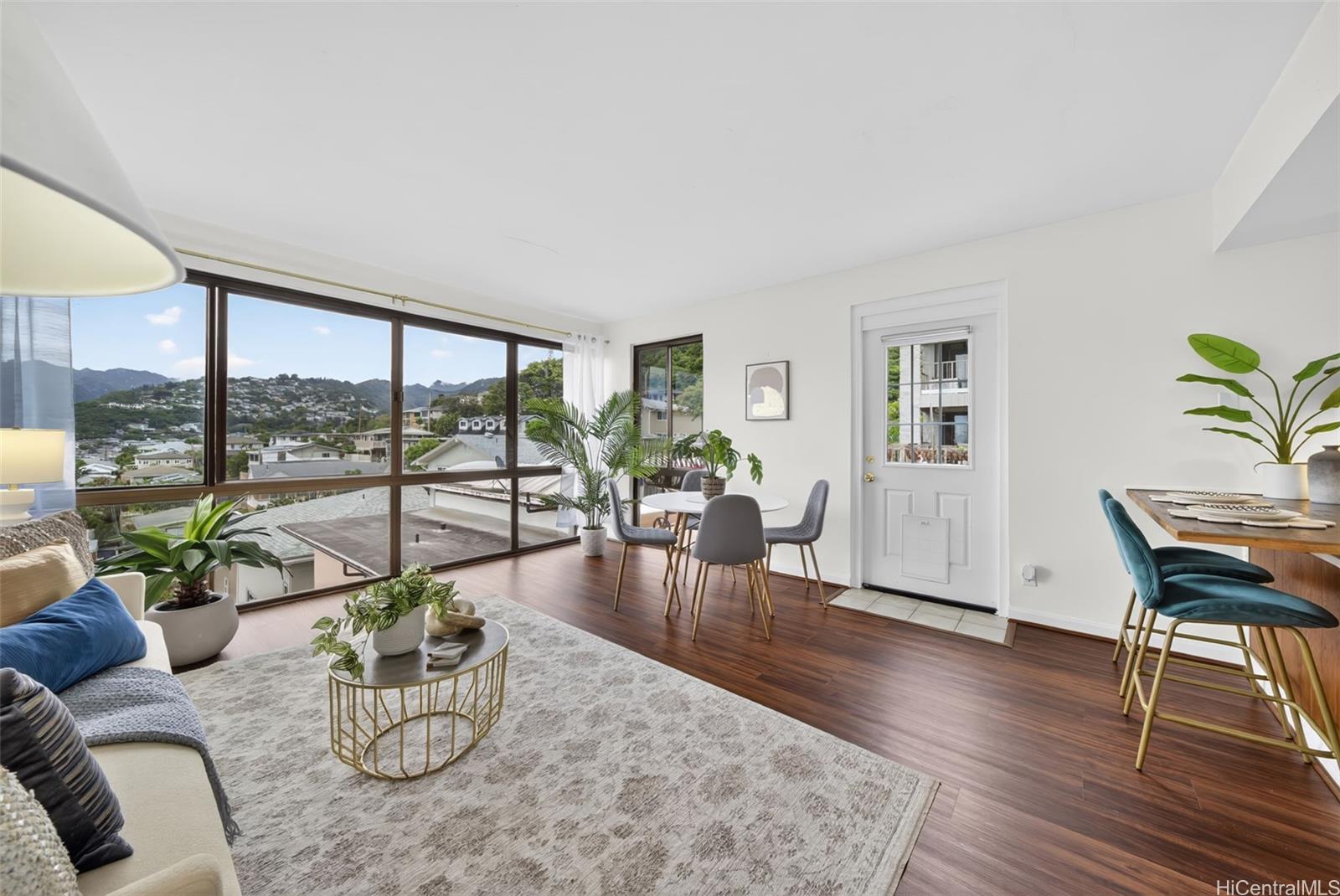 217 Prospect Street, Unit M9 Honolulu, HI 96813 - Photo 3 of 22 a living room with furniture large window and wooden floor