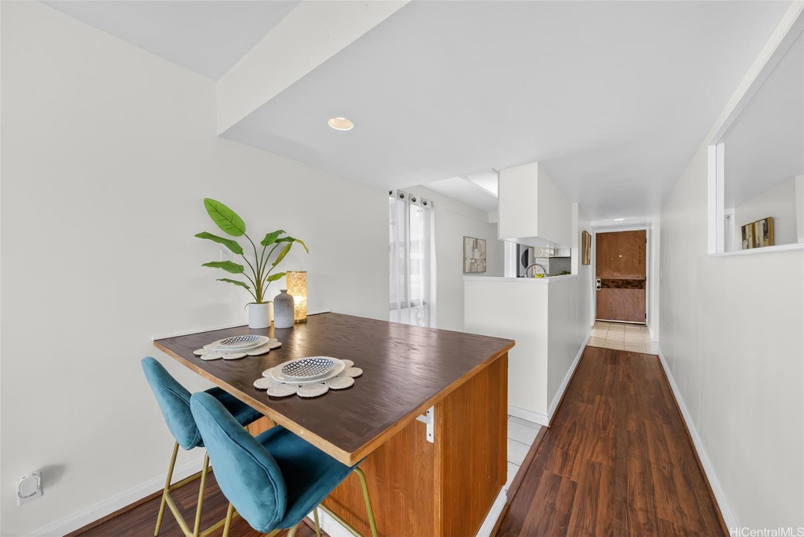 217 Prospect Street, Unit M9 Honolulu, HI 96813 - Photo 7 of 22 a view of a dining room with furniture and wooden floor