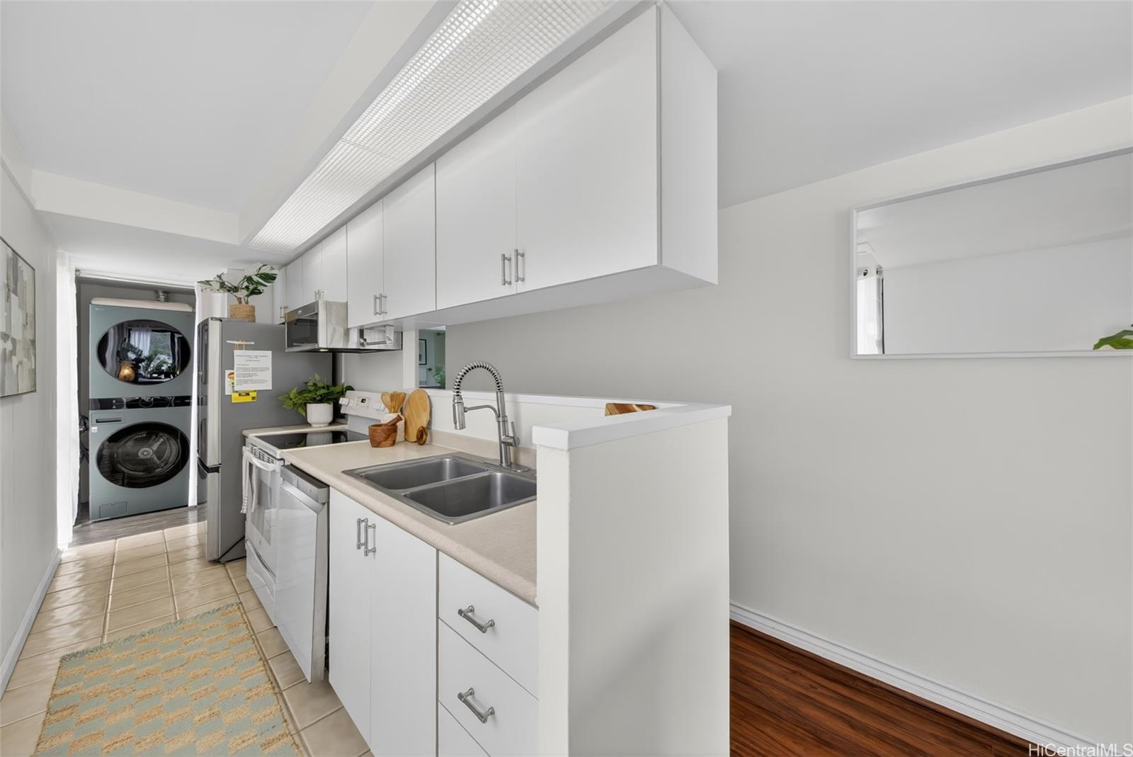217 Prospect Street, Unit M9 Honolulu, HI 96813 - Photo 9 of 22 a kitchen with a sink and refrigerator