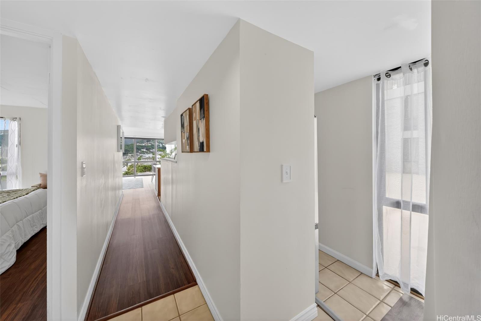 217 Prospect Street, Unit M9 Honolulu, HI 96813 - Photo 10 of 22 a view of a hallway with wooden floor and staircase