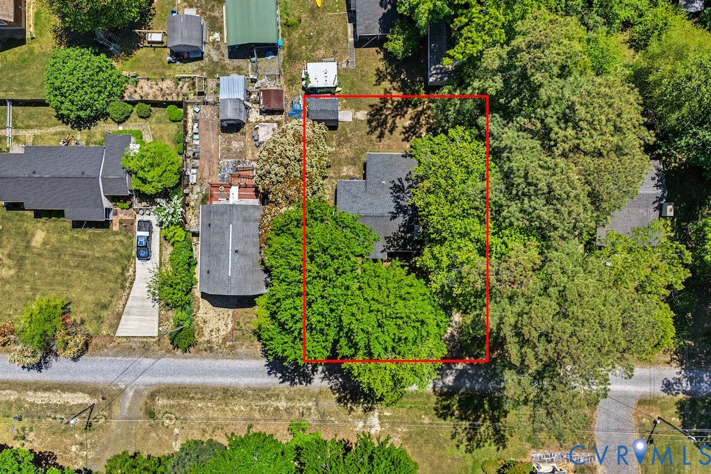 214 Davis Drive Reedville, VA 22539 - Photo 18 of 22 an aerial view of a house with a yard and garden
