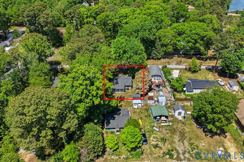 214 Davis Drive Reedville, VA 22539 - Photo 19 of 22 an aerial view of residential house with outdoor space and trees all around