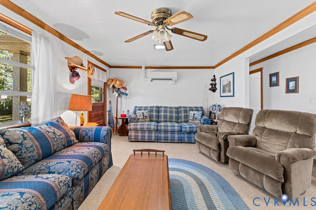 214 Davis Drive Reedville, VA 22539 - Photo 6 of 22 a living room with furniture