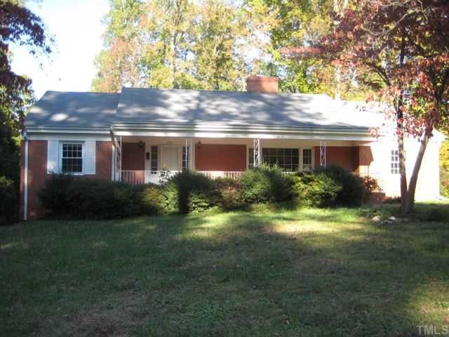 2749 Rothgeb Drive Raleigh, NC 27609 - Photo 1 of 2 a house view with a garden space