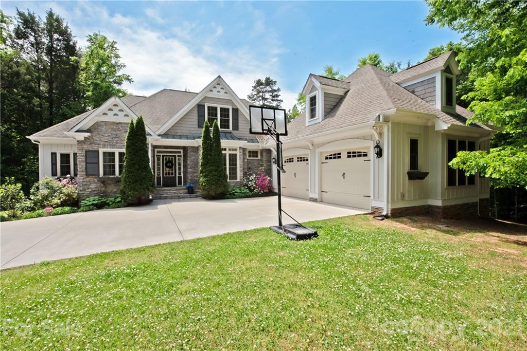 145 Huntington Ridge Place Mooresville, NC 28115 - Photo 1 of 45 front view of house with a yard