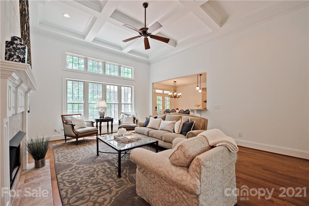 145 Huntington Ridge Place Mooresville, NC 28115 - Photo 11 of 45 a living room with furniture and a large window
