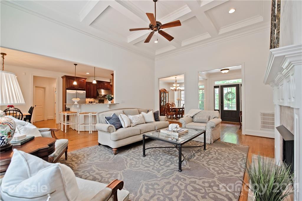 145 Huntington Ridge Place Mooresville, NC 28115 - Photo 13 of 45 a living room with furniture and wooden floor