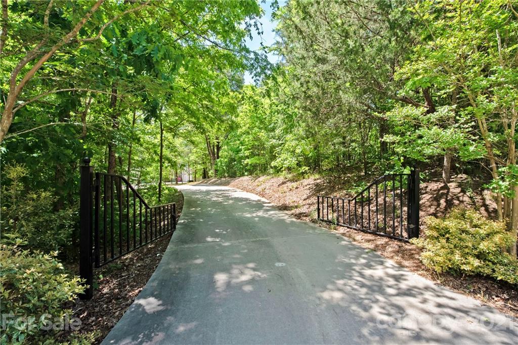 145 Huntington Ridge Place Mooresville, NC 28115 - Photo 3 of 45 a view of a yard