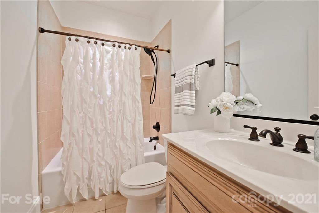 145 Huntington Ridge Place Mooresville, NC 28115 - Photo 29 of 45 a bathroom with a sink toilet and shower