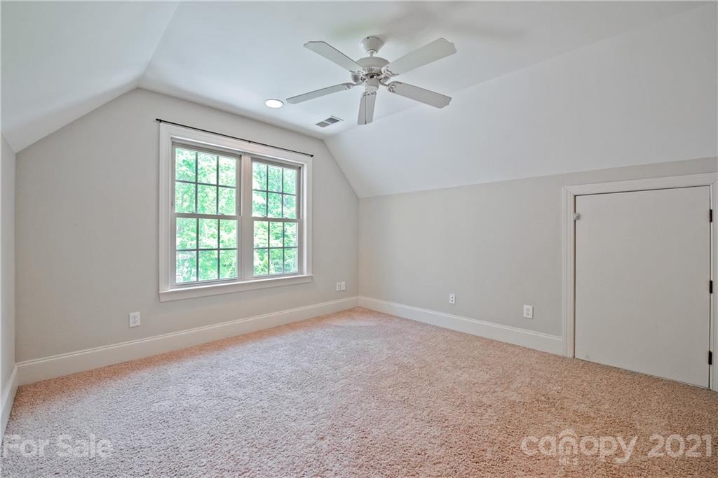 145 Huntington Ridge Place Mooresville, NC 28115 - Photo 33 of 45 a view of an empty room with a window