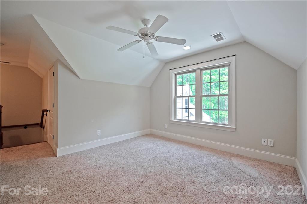 145 Huntington Ridge Place Mooresville, NC 28115 - Photo 34 of 45 a view of an empty room with a window