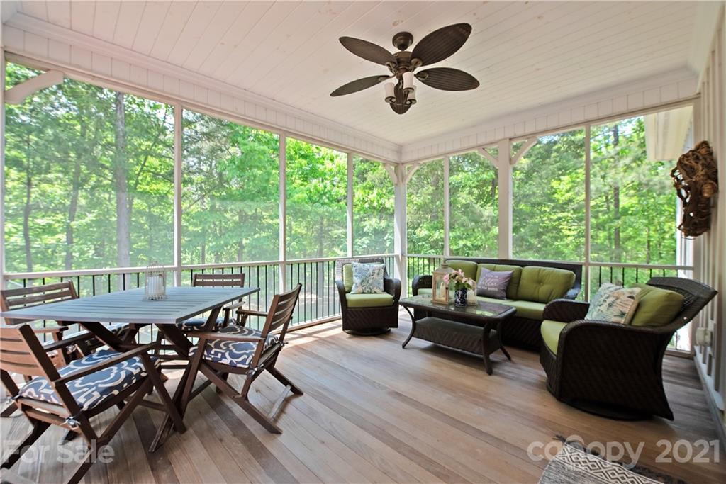 145 Huntington Ridge Place Mooresville, NC 28115 - Photo 37 of 45 a view of a dining room with furniture window and outside view