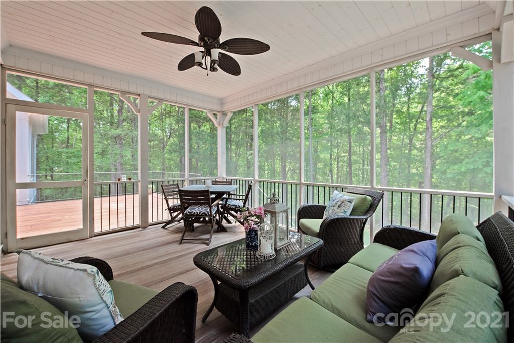 145 Huntington Ridge Place Mooresville, NC 28115 - Photo 38 of 45 a living room with furniture and a large window