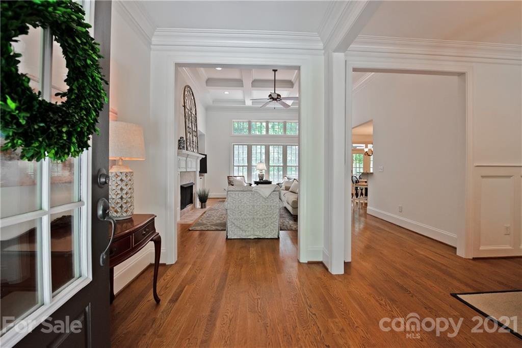 145 Huntington Ridge Place Mooresville, NC 28115 - Photo 5 of 45 a living room with furniture and a wooden floor