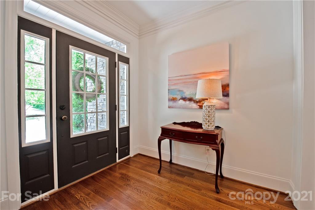 145 Huntington Ridge Place Mooresville, NC 28115 - Photo 6 of 45 a view of a room with a window and wooden floor