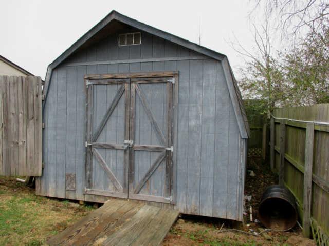 995 Rose Hill Road Pulaski, TN 38478 - Photo 18 of 20 a wooden door in front of a house