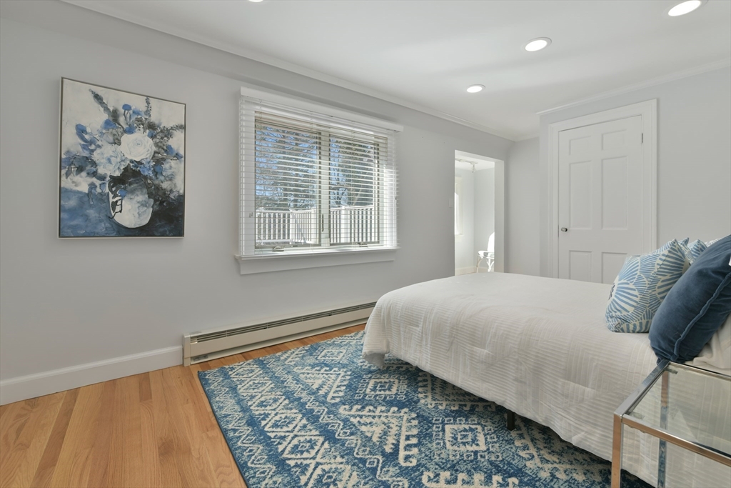 17 Laurel Road Brookline, MA 02467 - Photo 15 of 29 a bedroom with a bed and a window