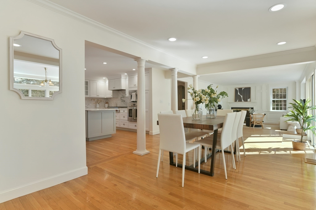 17 Laurel Road Brookline, MA 02467 - Photo 3 of 29 a view of a dining room with furniture and wooden floor