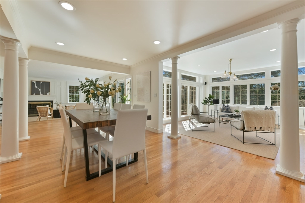 17 Laurel Road Brookline, MA 02467 - Photo 4 of 29 a dining room with furniture and wooden floor
